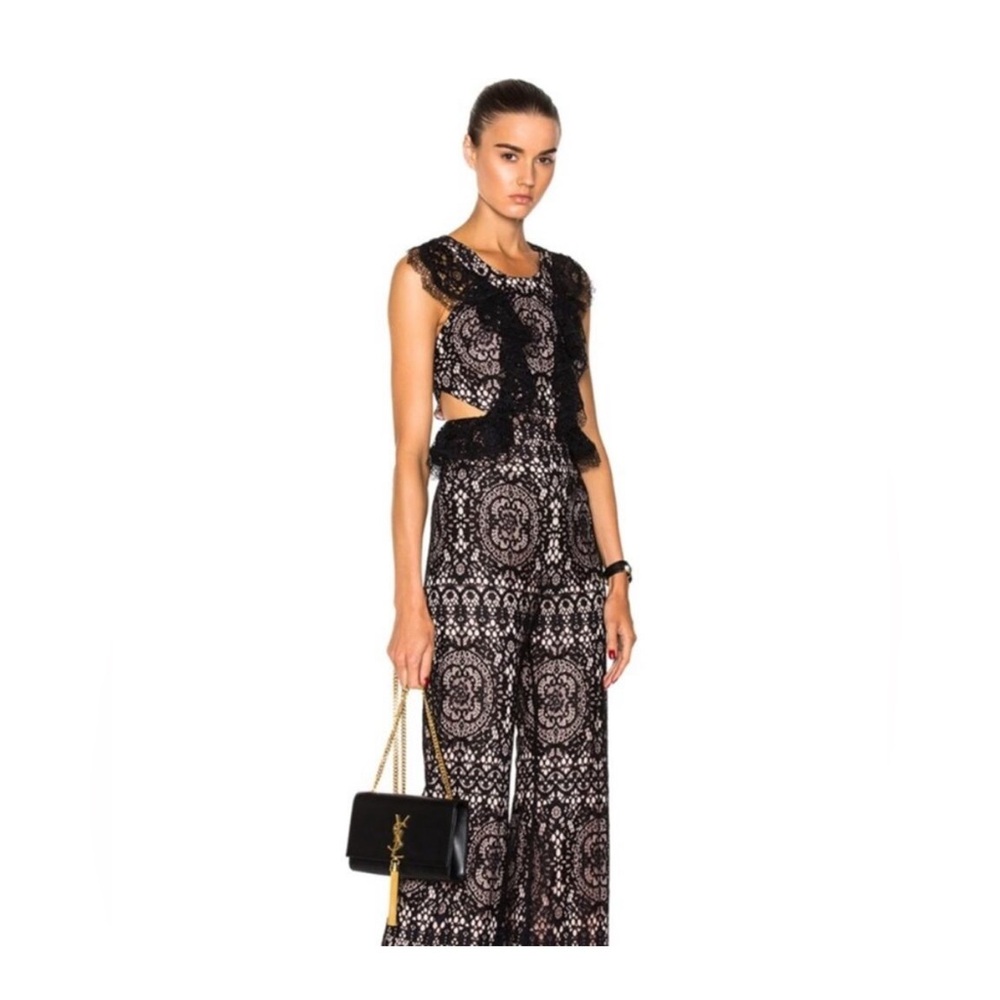 Alexis Anka ruffle side cut out lace flared jumpsuit  Black with Pink Lining